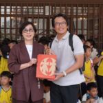 高青集團陳慧姝總經理與嘉南國小校長合影